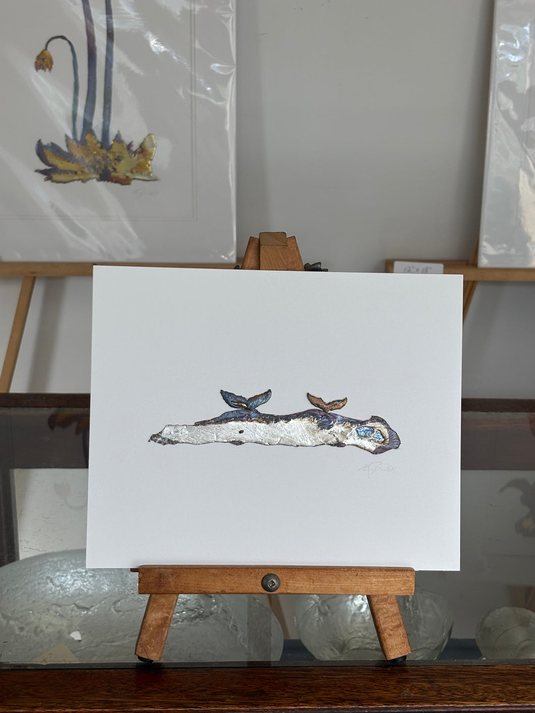 Whale tails with with water